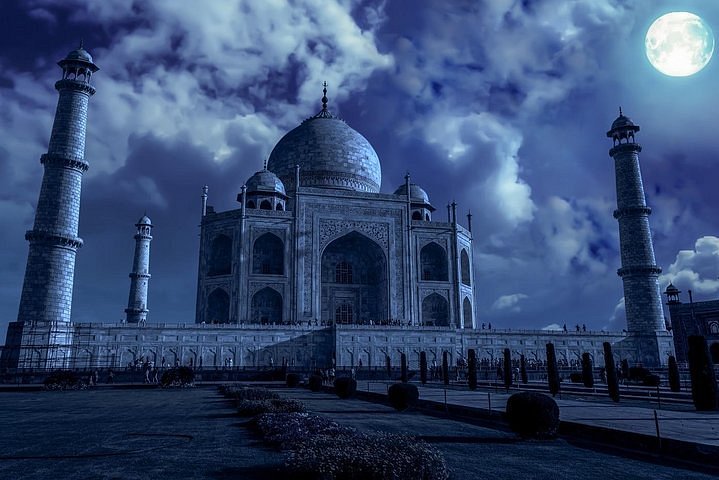 Taj Mahal viewed across the Yamuna River from Mehtab Bagh in Agra