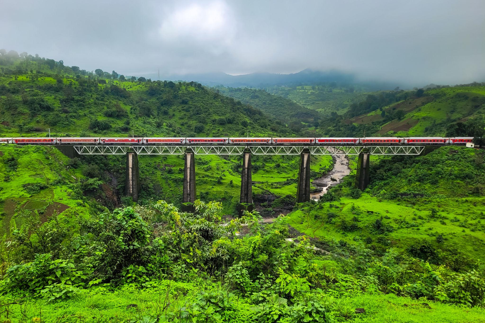 Train in India Crossing the Bridge